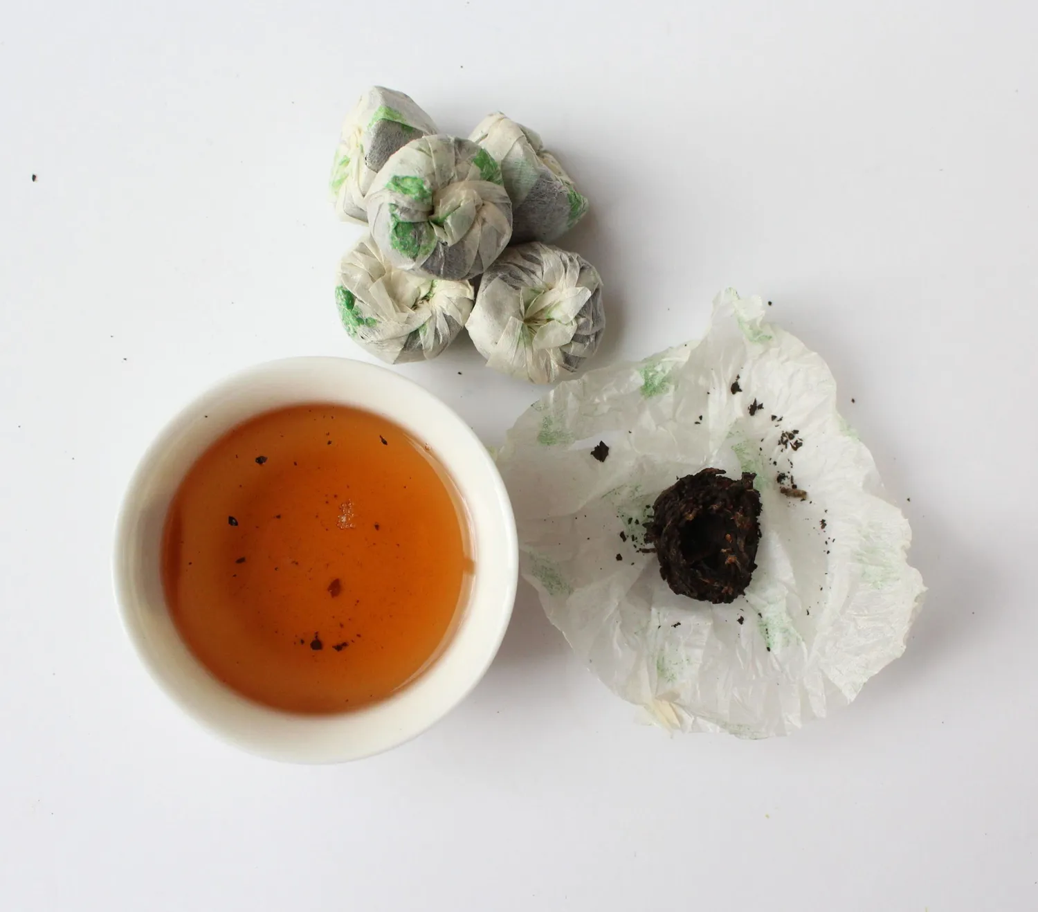 Tea Leafs Pu-Erh mini Tuo Cha thee losse nestjes aards