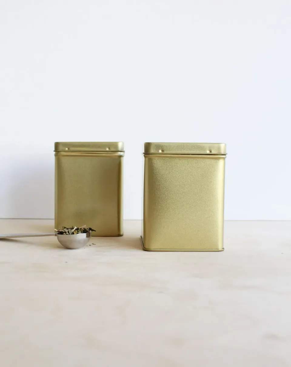 Tea Leafs Blik vierkant 100 gram theeblik goud